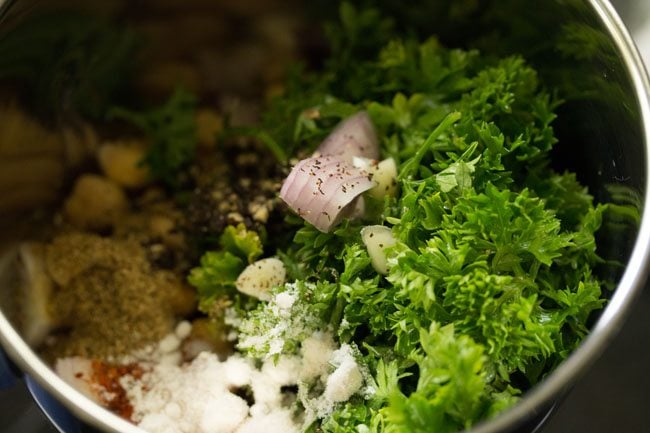 spices and herbs added to blender jar