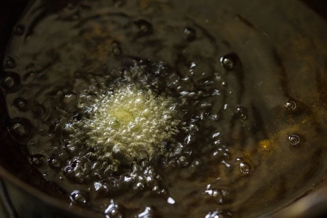 frying falafel in wok