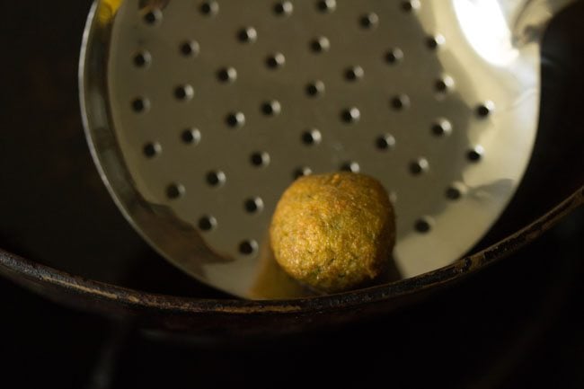 removing fried falafel