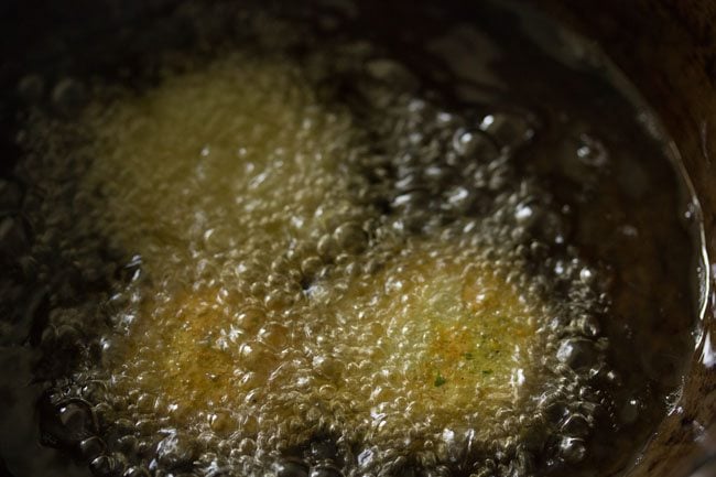 frying falafel in wok