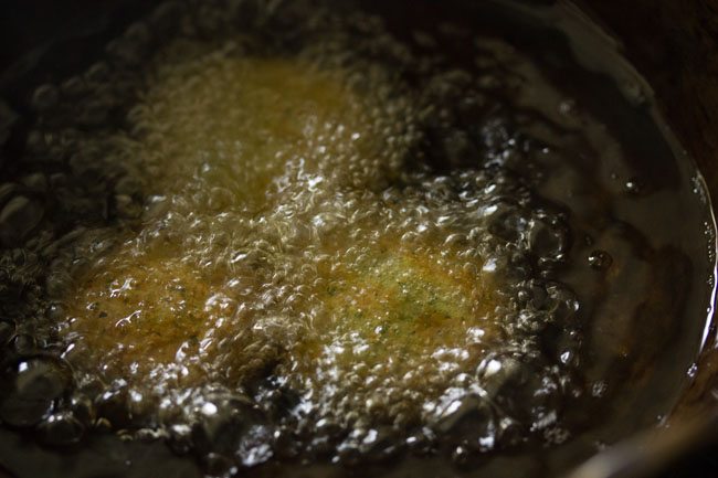 frying falafel in wok