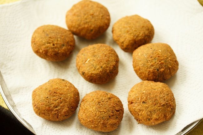 fried herb falafel on kitchen paper towels