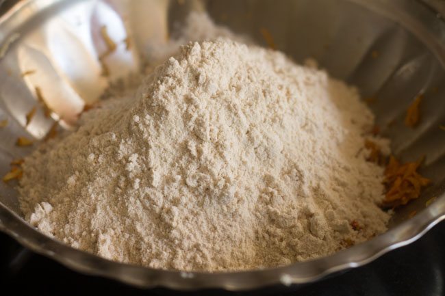 whole wheat flour added to spiced radish mixture. 