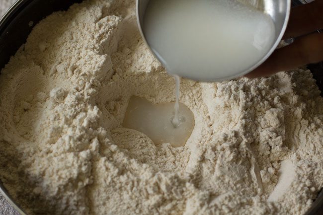 adding buttermilk to flour mixture. 