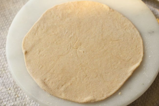 stuffed naan rolled into a disc, 