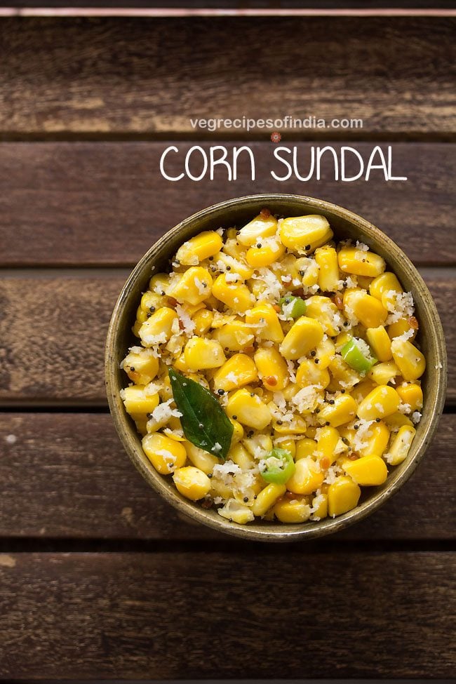 sweet corn sundal served in a ceramic bowl with text layover.