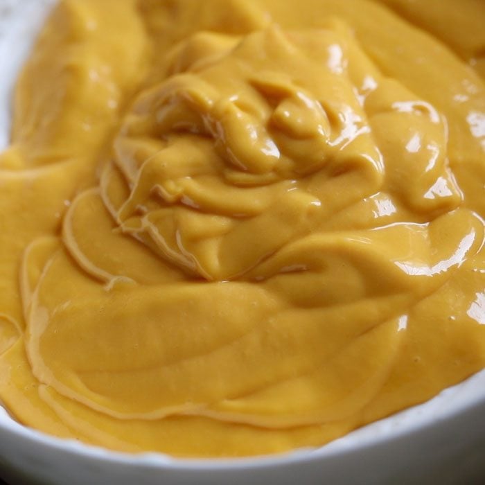 mango mixture on top of the whipped cream
