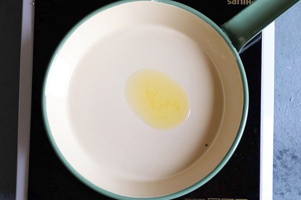 ghee melted in a frying pan.