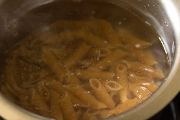 cooking penne pasta. 