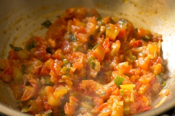 sautéing tomatoes till they soften. 