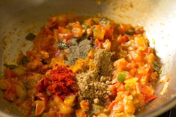 spice powders added to tomatoes. 