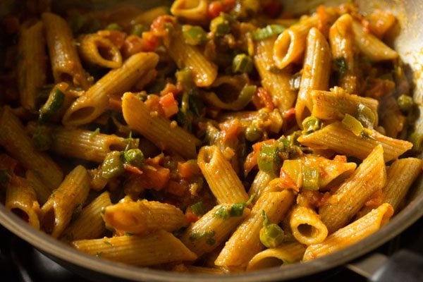 garam masala powder mixed well with the penne pasta. 
