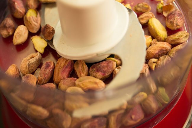 pistachios in food chopper to make pistachio ice cream