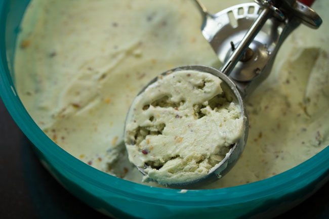 pistachio ice cream scooped in ice cream maker