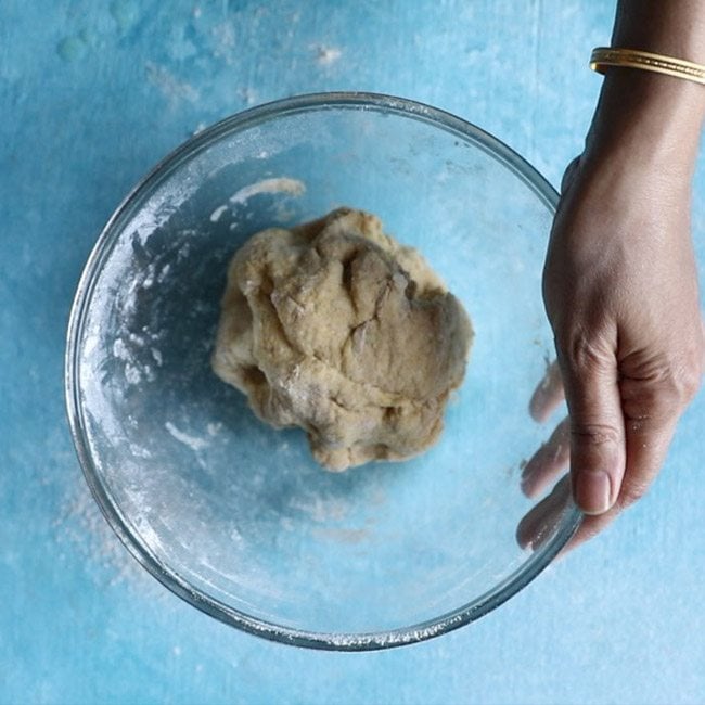 ingredients kneaded lightly for making dough for holige recipe. 