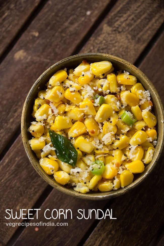 sweet corn sundal served in a ceramic bowl with text layovers. 