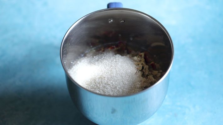 sugar added in the grinder for making thandai paste. 