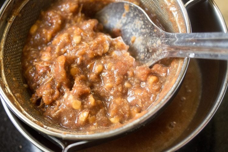 straining mashed pulp. 