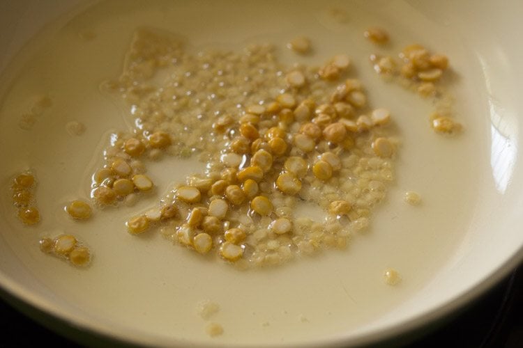 lentils in oil in a pan