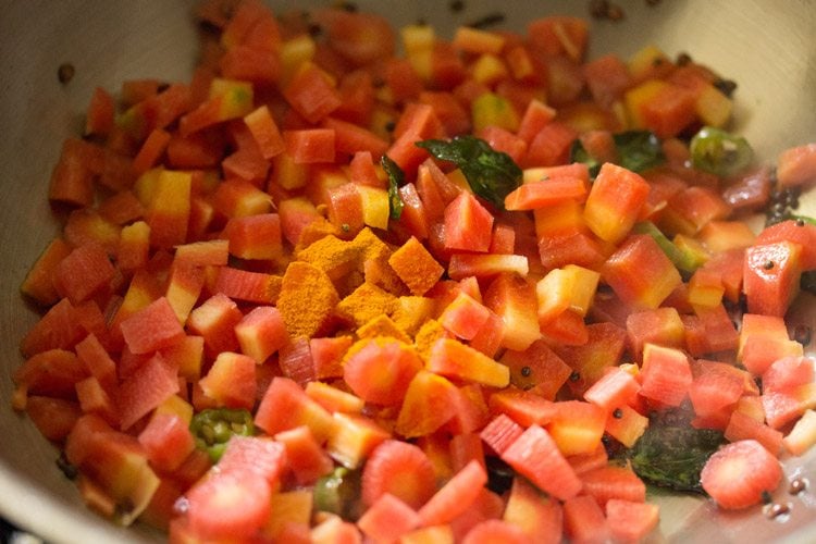 turmeric powder added to the carrots. 