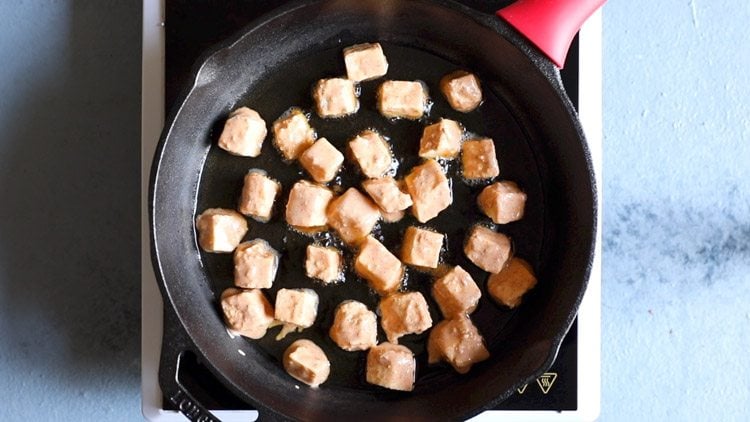 pan frying battered paneer for preparing chilli paneer restaurant style recipe