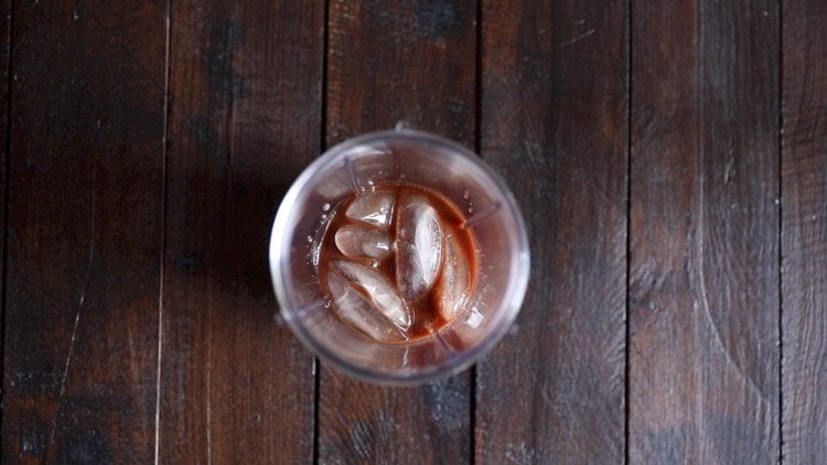 ice cubes added in blender jar. 