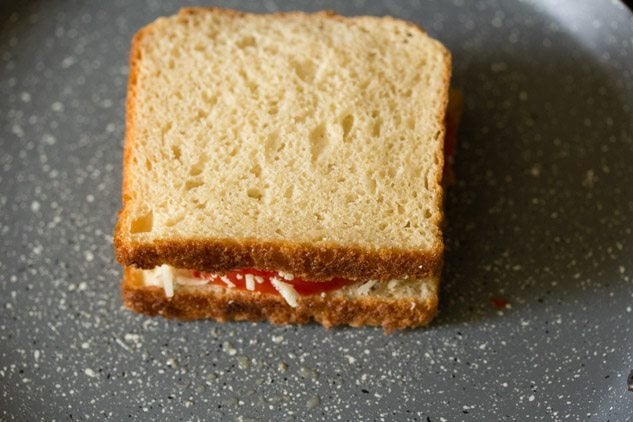 prepared sandwich placed on the butter. 