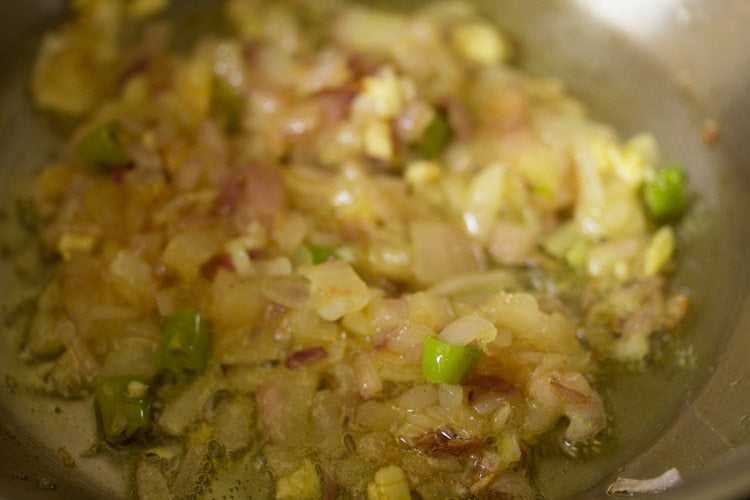 spice powders mixed well in the onions. 