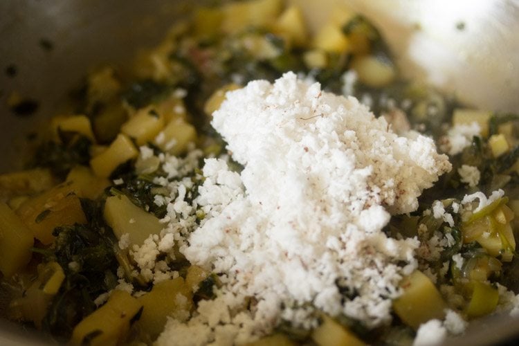 fresh grated coconut added to pan. 