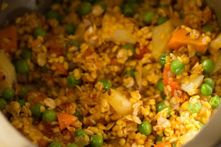 mixing spices with mixture
