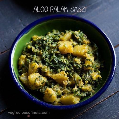 palak ki sabji served in a ceramic bowl with text layovers.