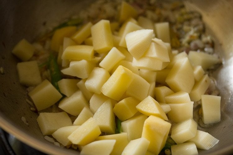 chopped potatoes added to the onions. 