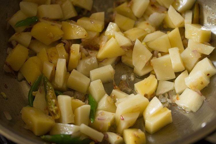 chopped potatoes mixed well with the onion mixture. 