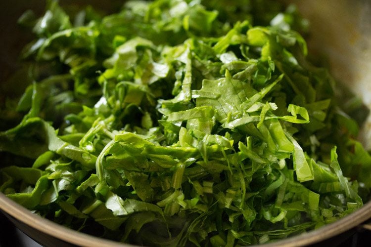 finely chopped spinach added to the potatoes. 