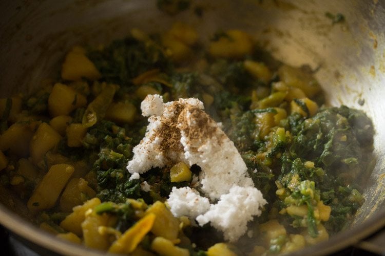 garam masala powder added to the palak ki sabji. 