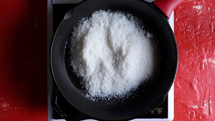 desiccated coconut powder in skillet