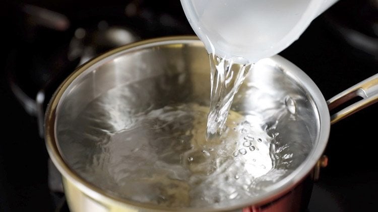 water in a saucepan.