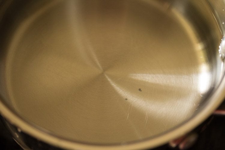 heating water in a saucepan. 