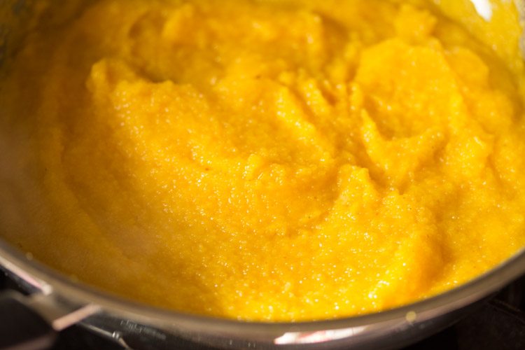 cooked mango kesari in the pan. 