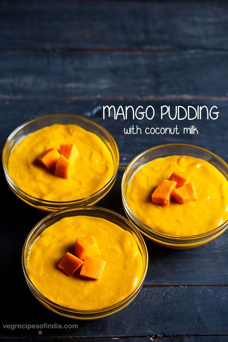 3 bowls of mango pudding on a dark blue table
