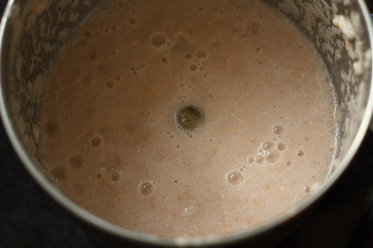 puréed pomegranate seeds and juice in a blender