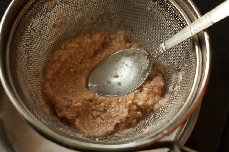 pressing puréed pomegranate juice with the back of the spoon for my easy recipe