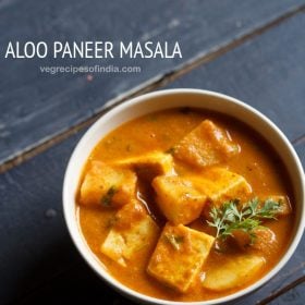 aloo paneer served in a bowl, garnished with coriander sprig