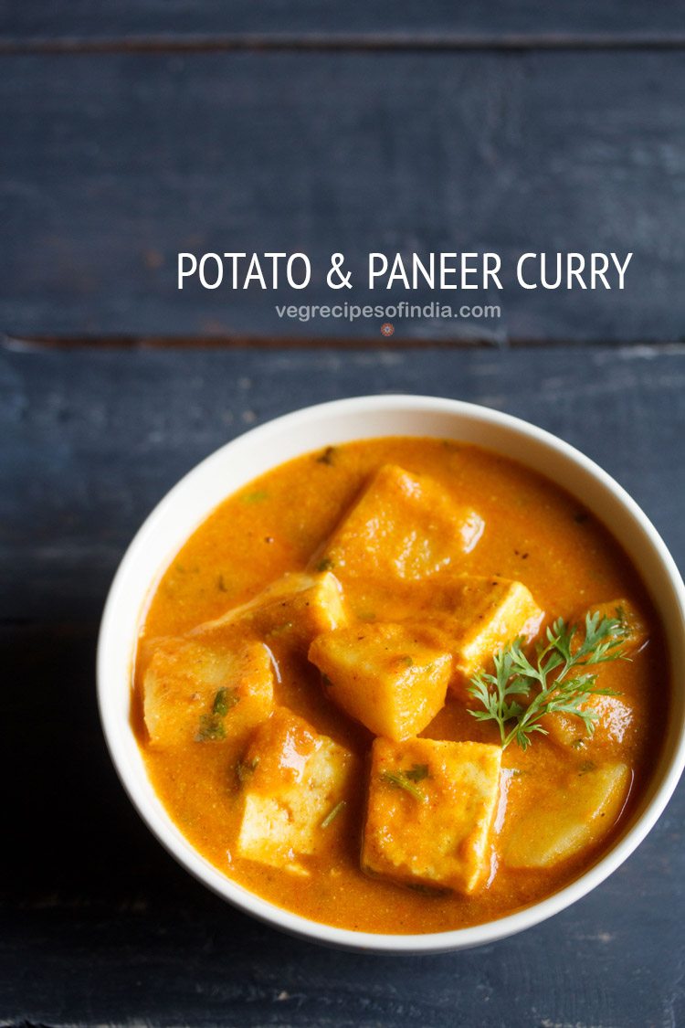 aloo paneer served in a bowl, garnished with coriander sprig 