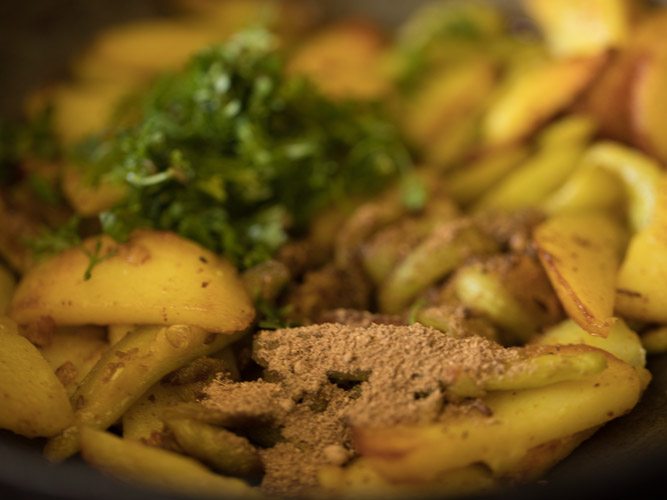 spices and coriander leaves addded