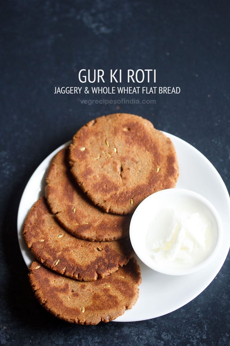 gur ki roti served on white plate with a bowl of butter