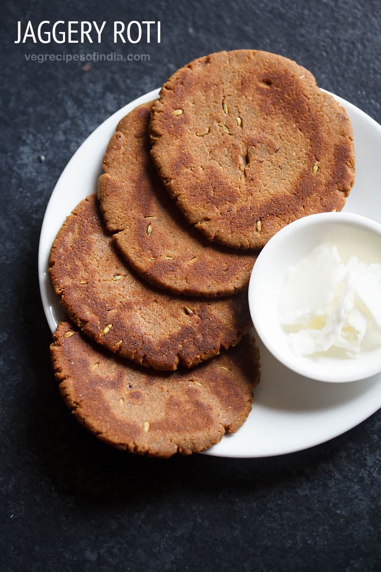 gur ki roti served on white plate with a bowl of white butter and text layover.