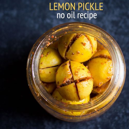 lemon pickle in a glass jar on a blue board