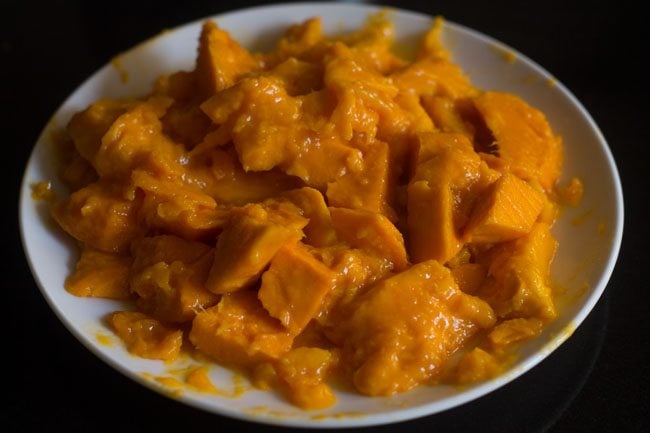 chopped mango for mango modak. 