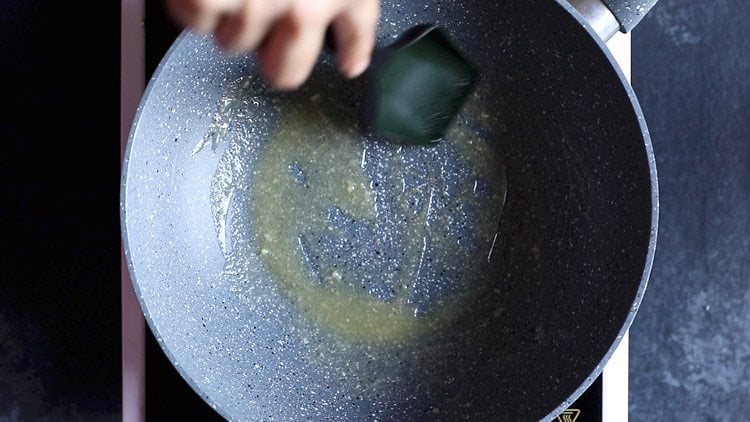 swirling the ghee on all sides of the pan.